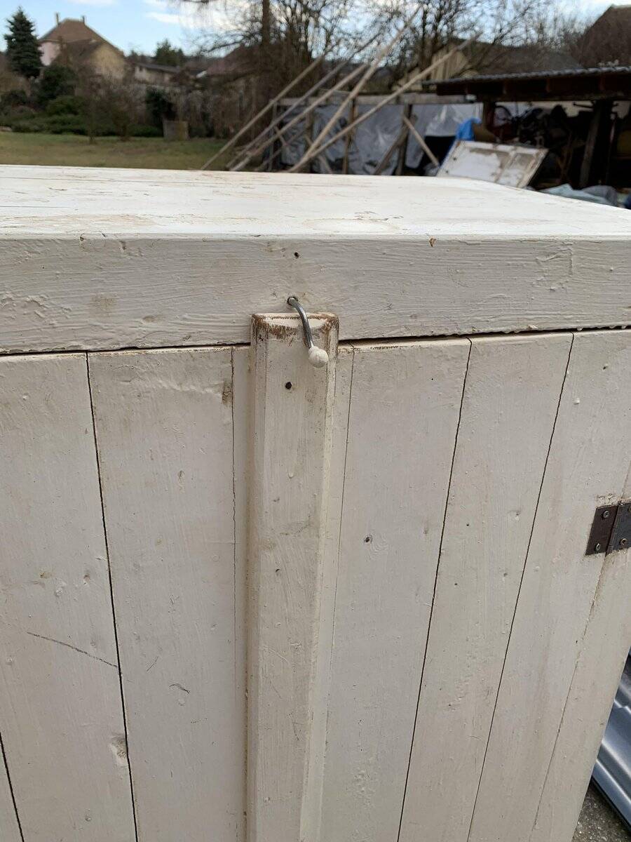 Antique beige-painted solid wood furniture, rustic late 19th-century cabinet with a single door.