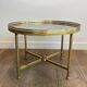 Brass coffee table with a vintage mirror top from the Baguès house.