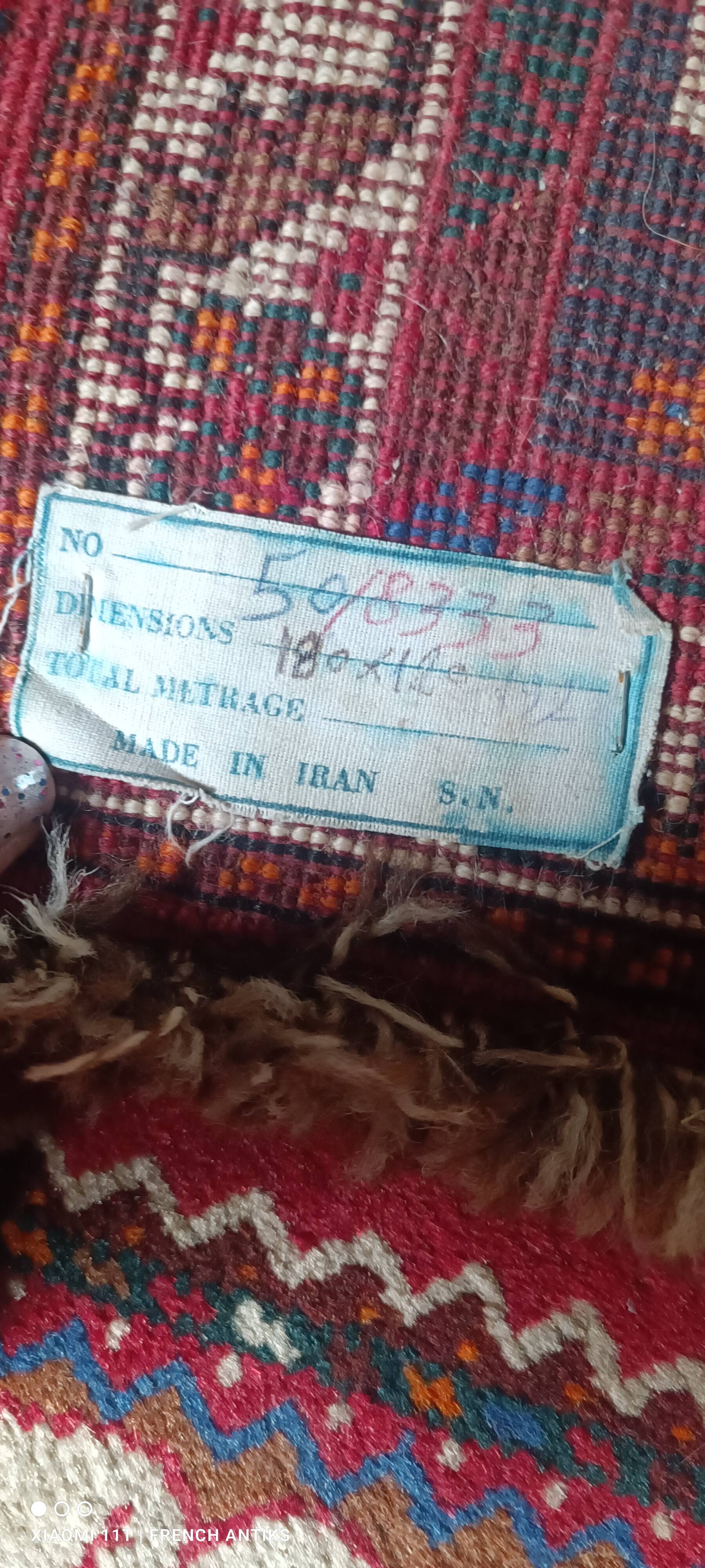 Vintage Iranian rug from the 1950s. Handcrafted, handmade.