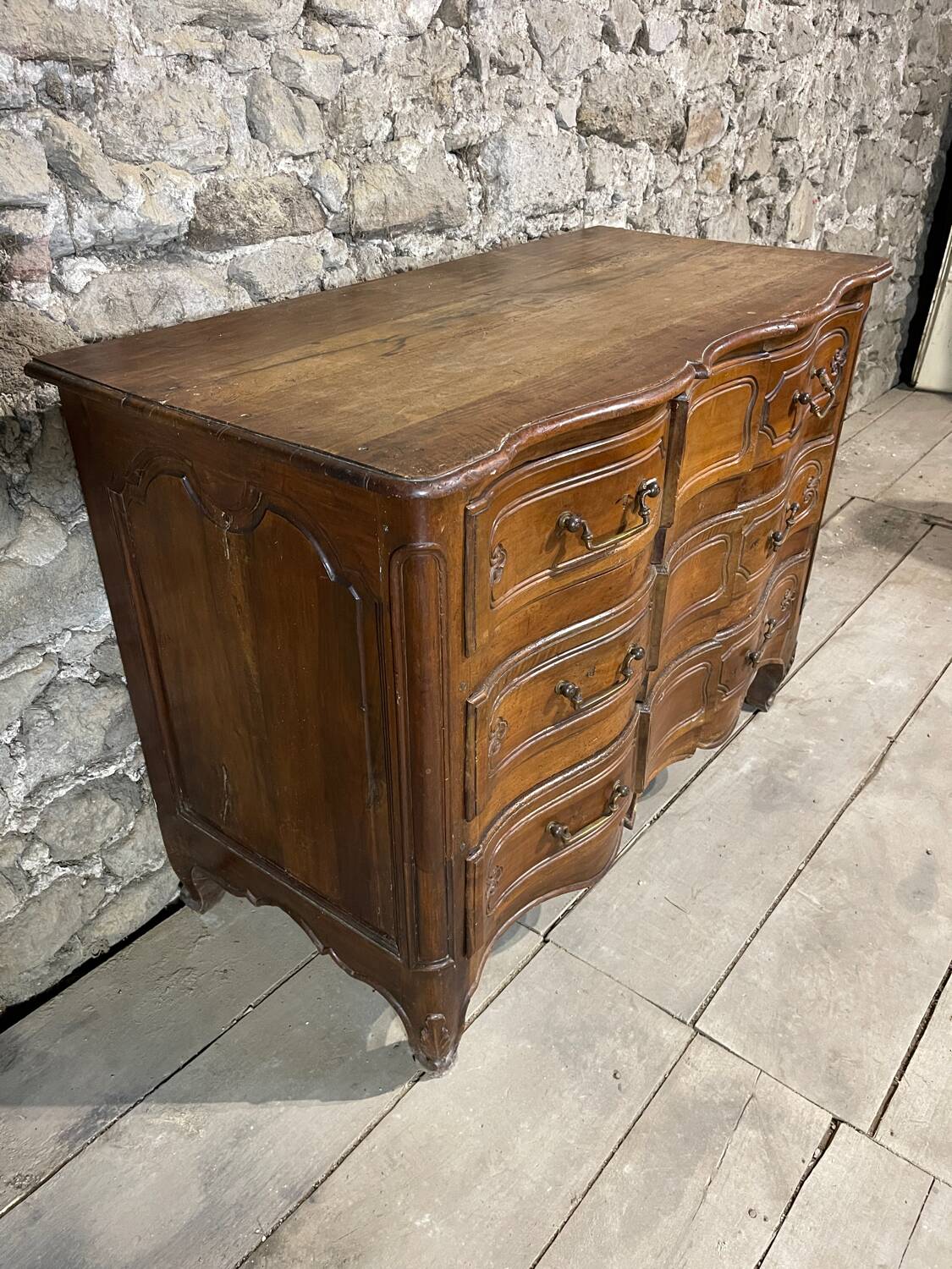 19th century crossbow chest of drawers.