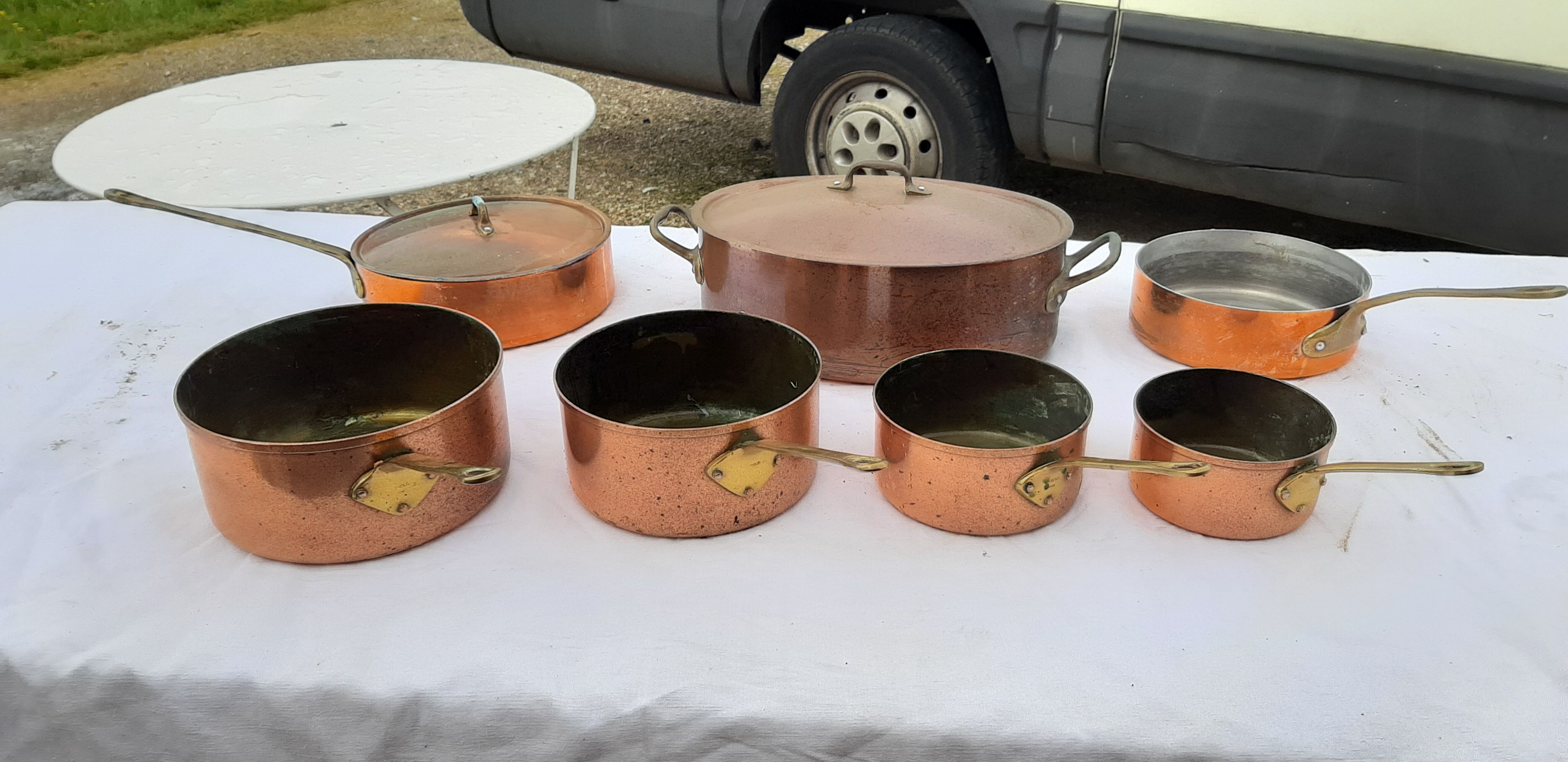 Lots of tinned copper kitchen utensils