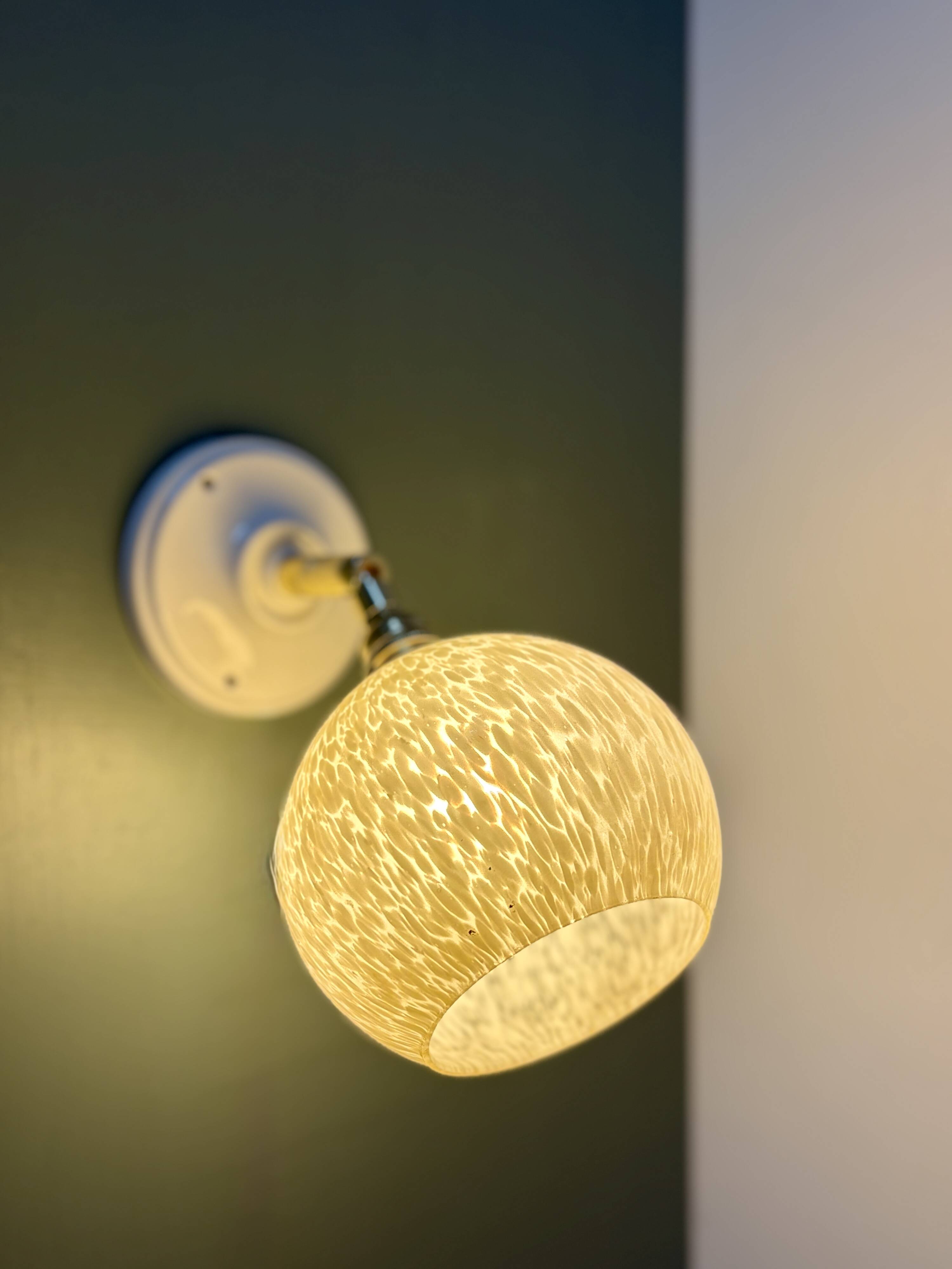 Vintage glass globe wall light in pale yellow from Clichy.