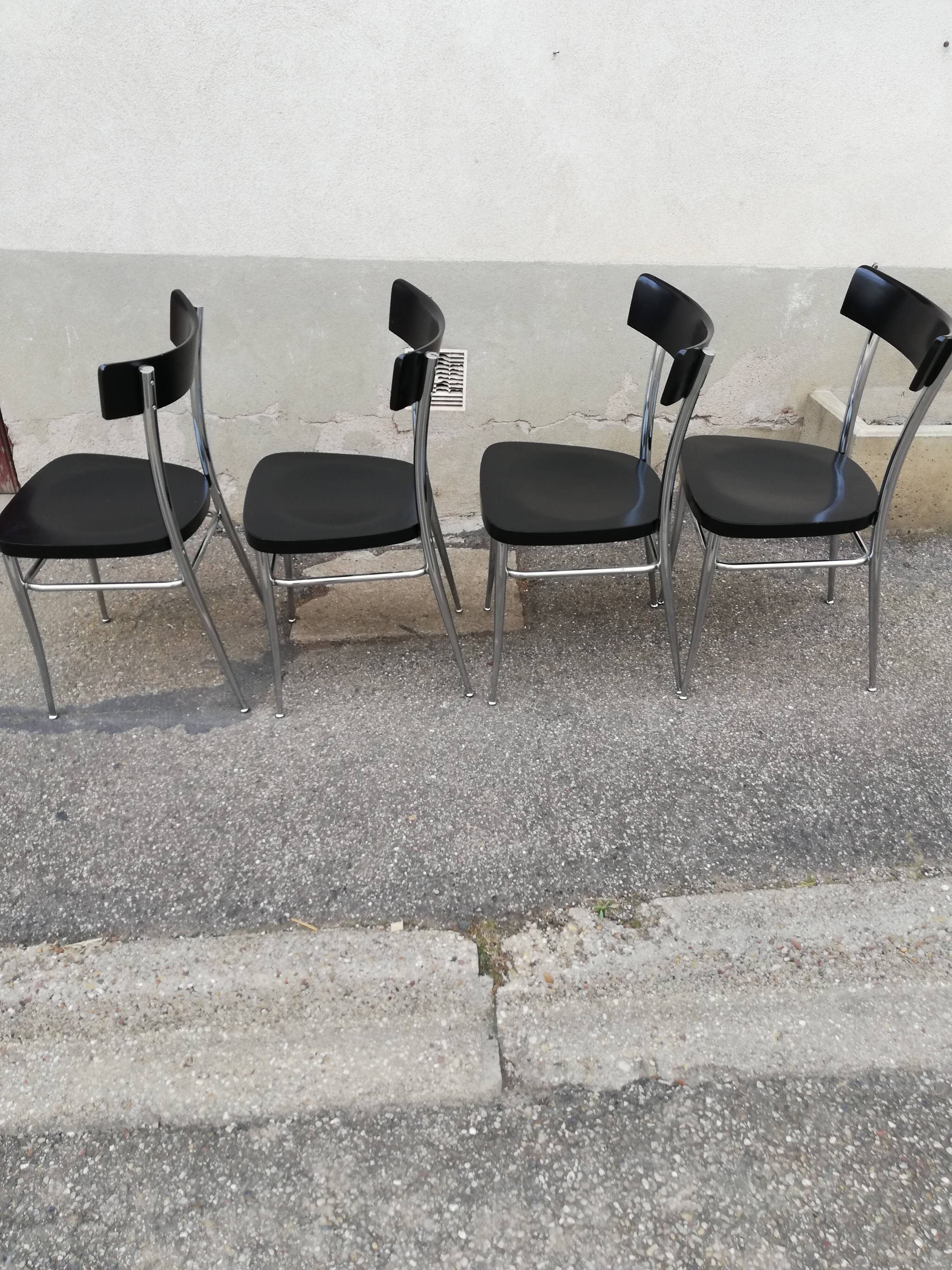 Set of 4 vintage chairs chrome and black wood