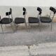 Set of 4 vintage chairs chrome and black wood