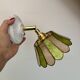 Vintage wall lamp with a green and pink mother-of-pearl lampshade