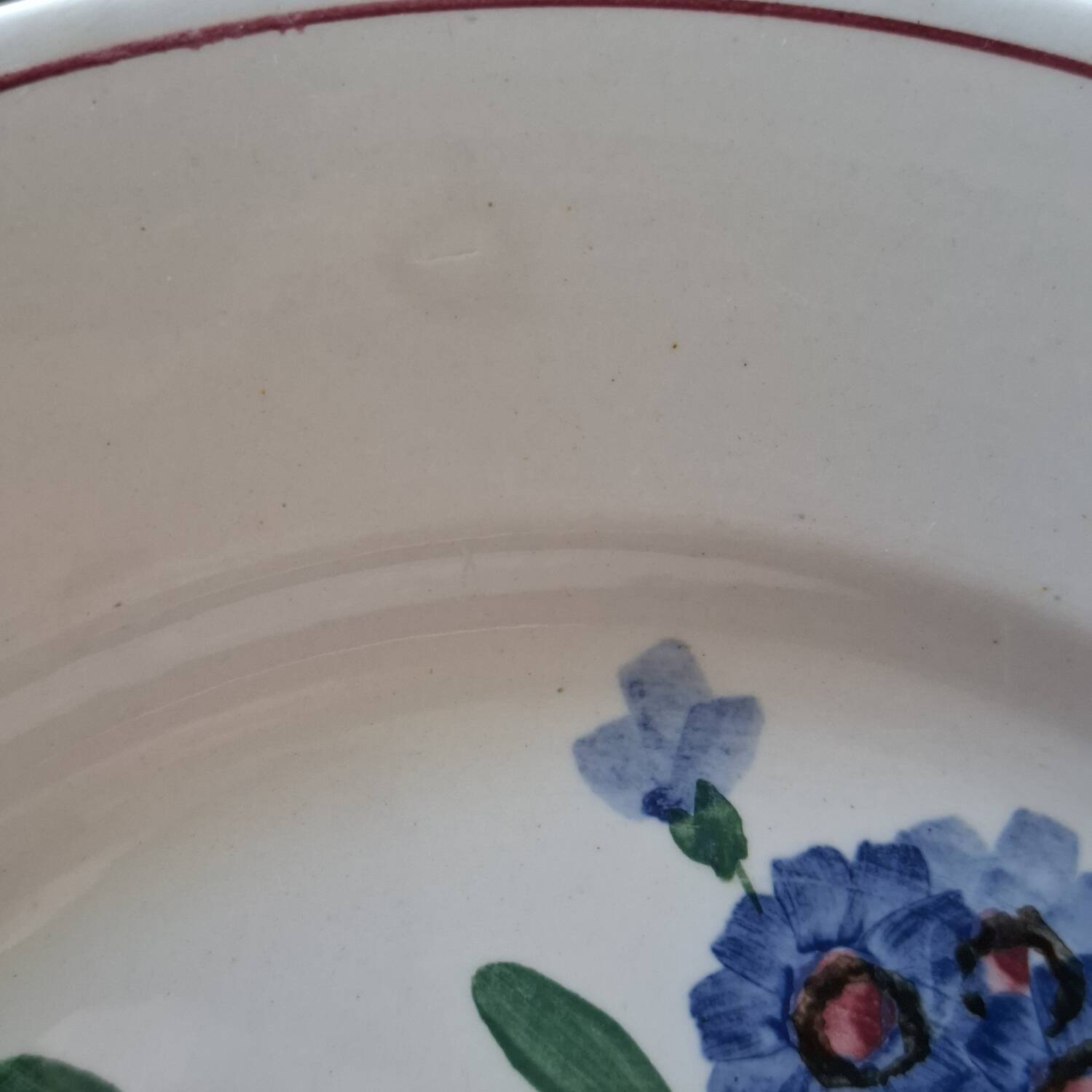 Old mismatched earthenware dinner plates