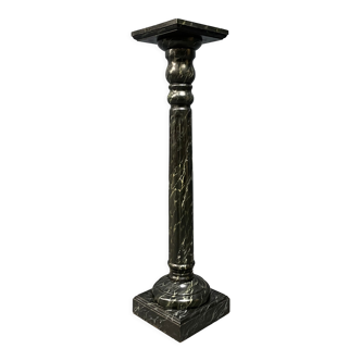 Dark marbled wooden column or pillar