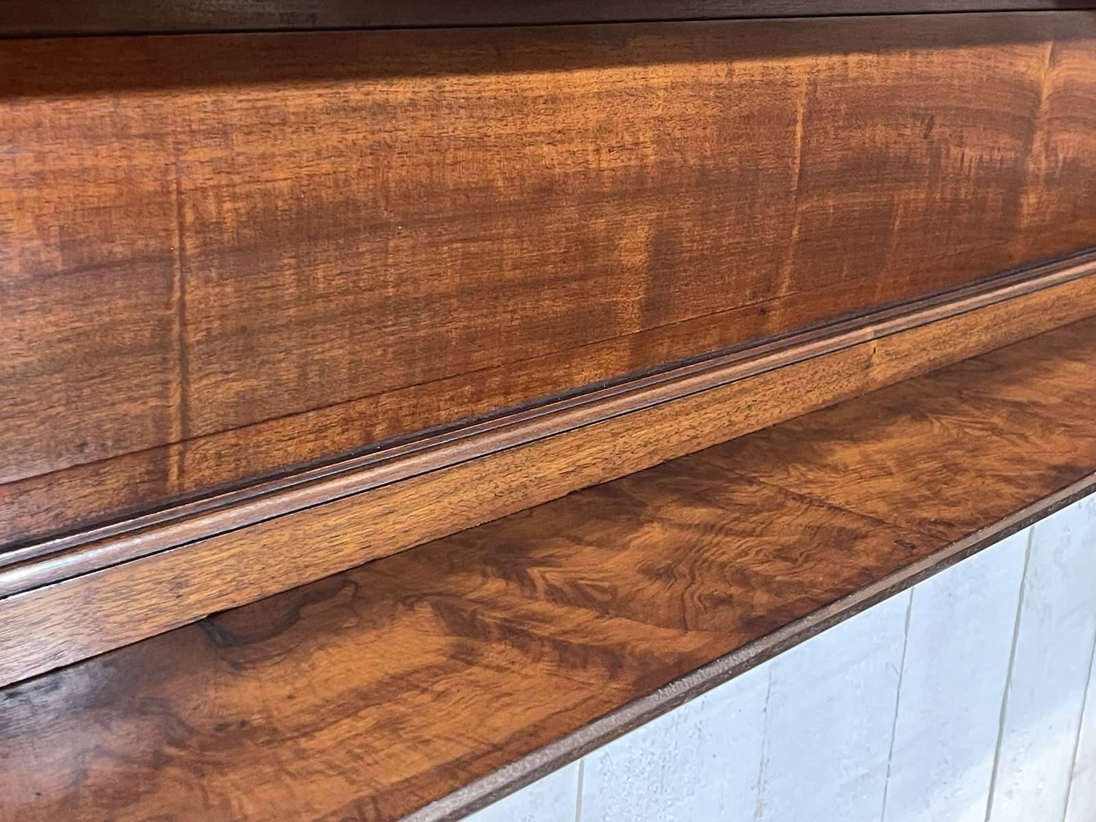 English walnut shelf from the early 20th century.