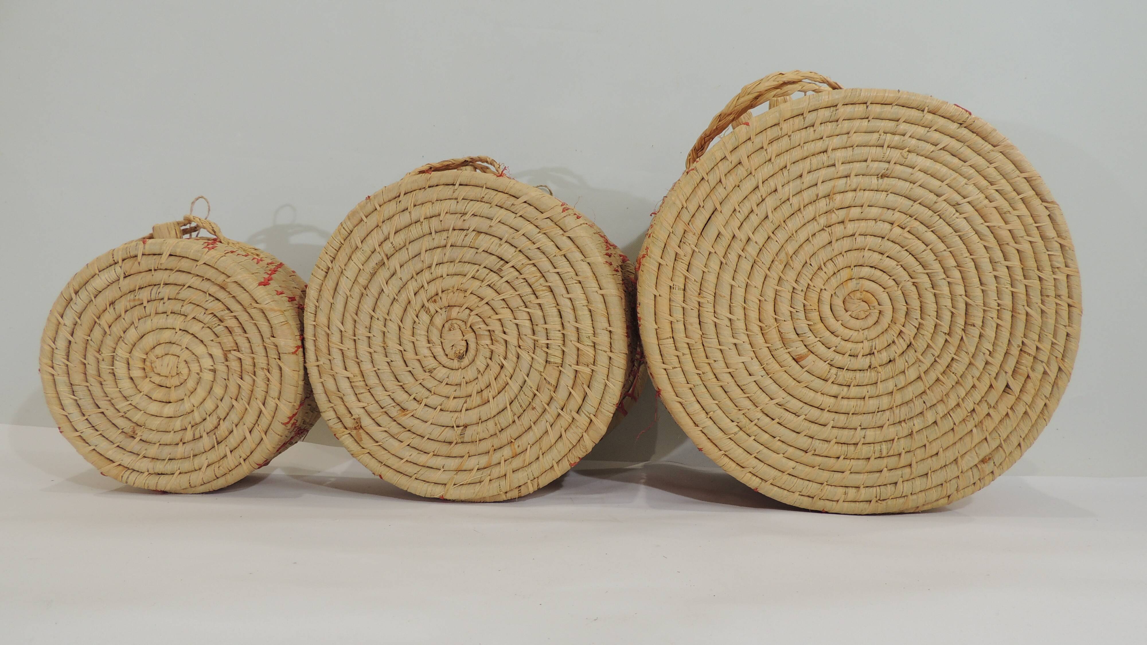 Set of three african raffia basket