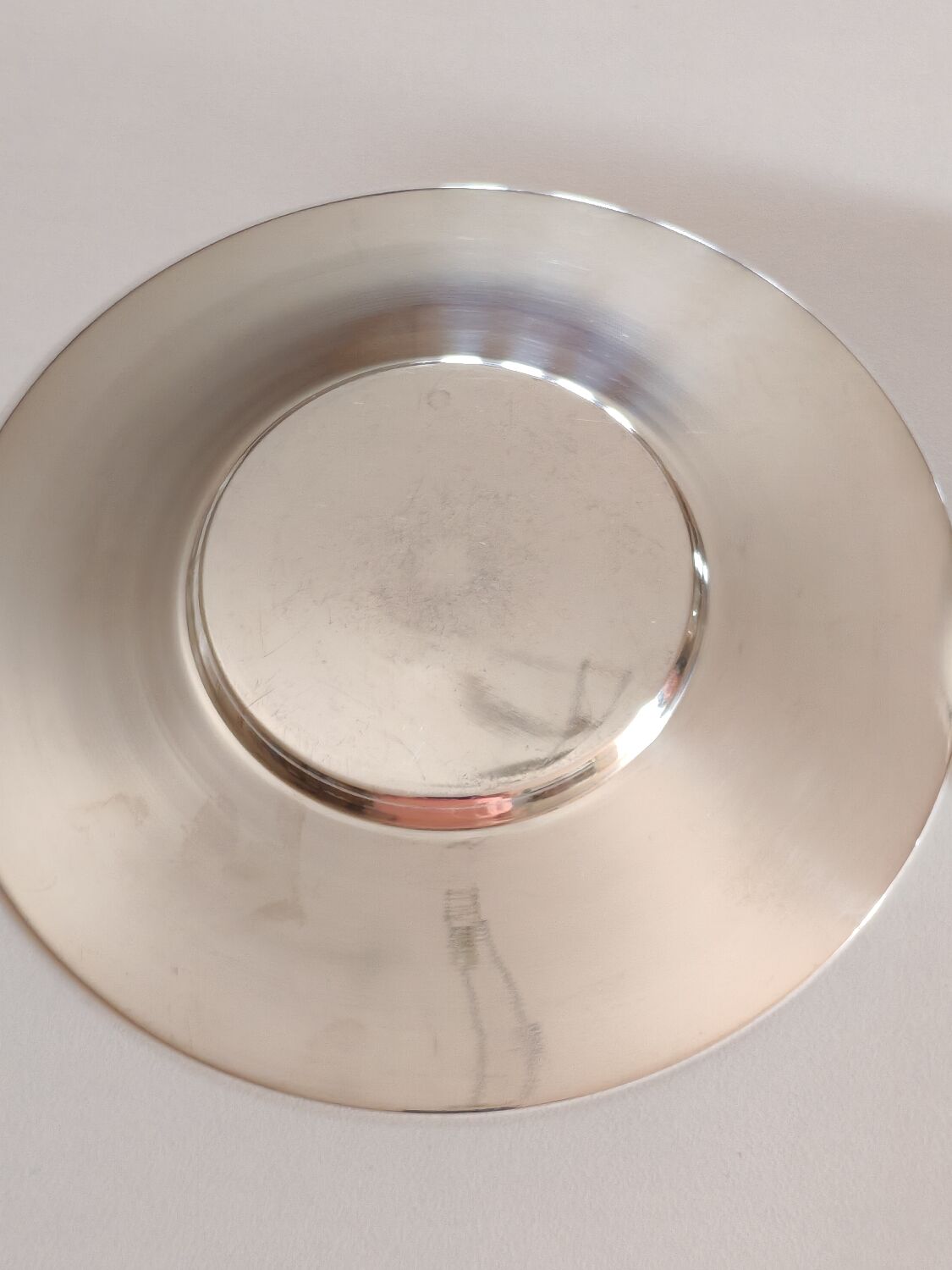 Silver-plated metal cup and saucer