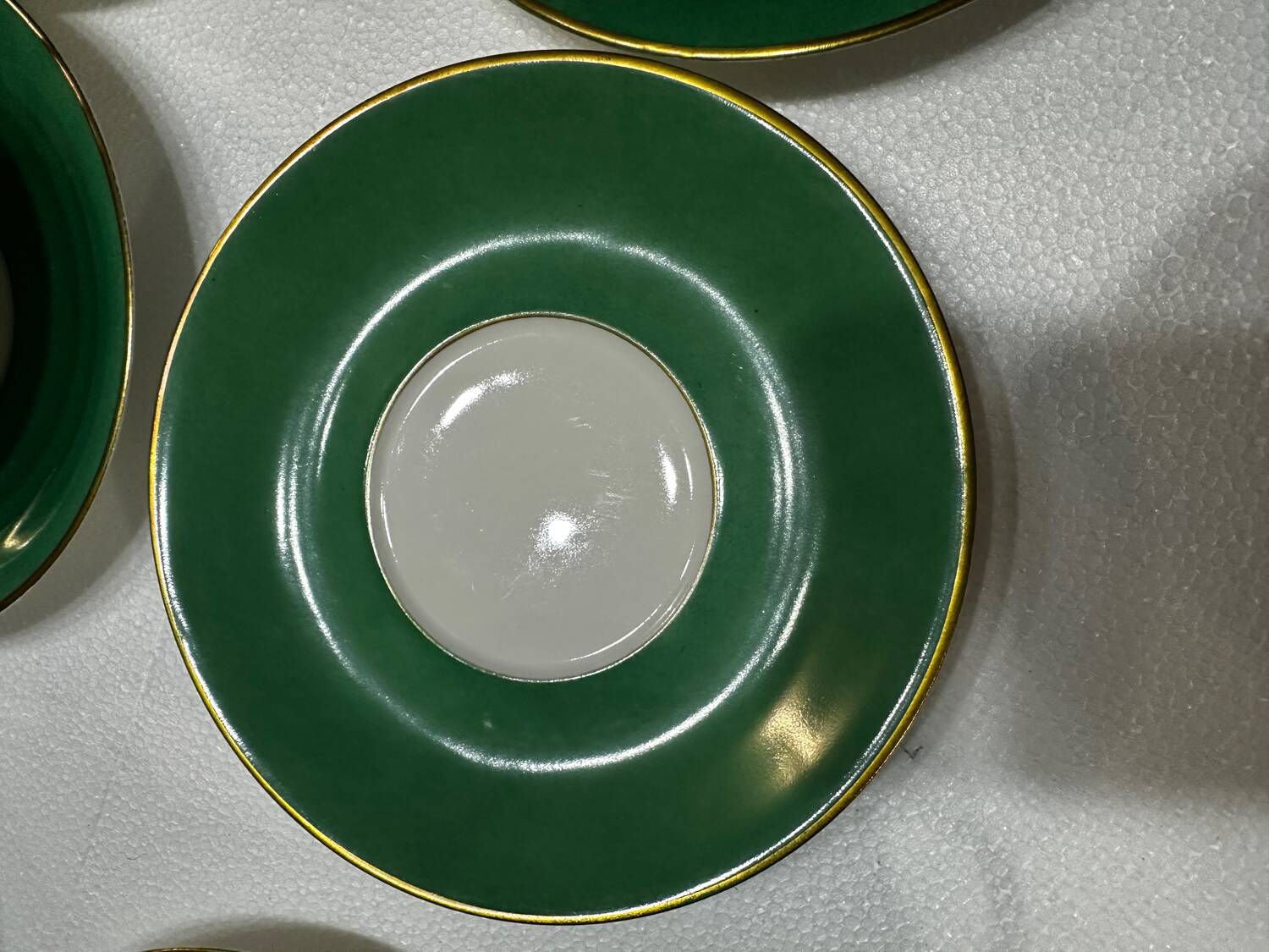 Service 14 cup and saucer in Art Deco Emerald Green and Gold.