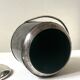 Vintage chrome metal ice bucket with black marbled design, 1970s style.