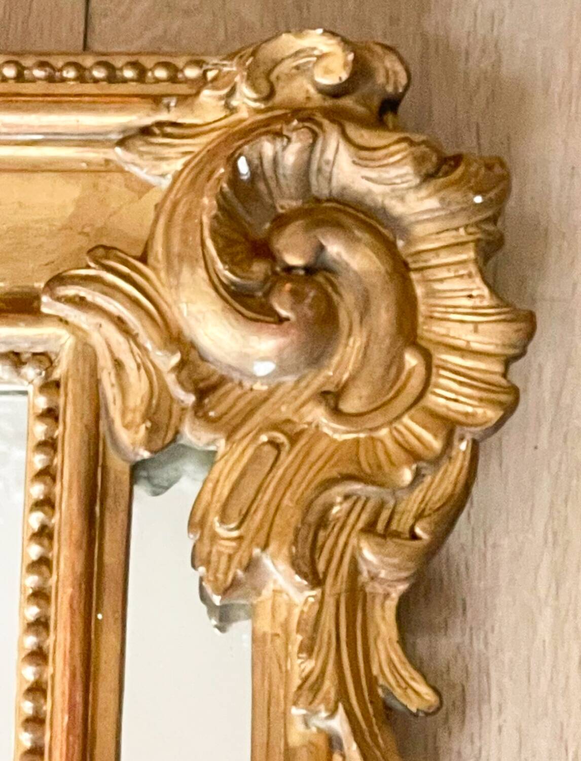 Large wooden and gilded stucco mirror with parecloses - 19th century