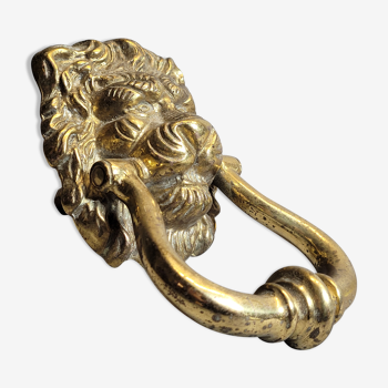 Heurtoir de porte en bronze doré à forme de tête de lion