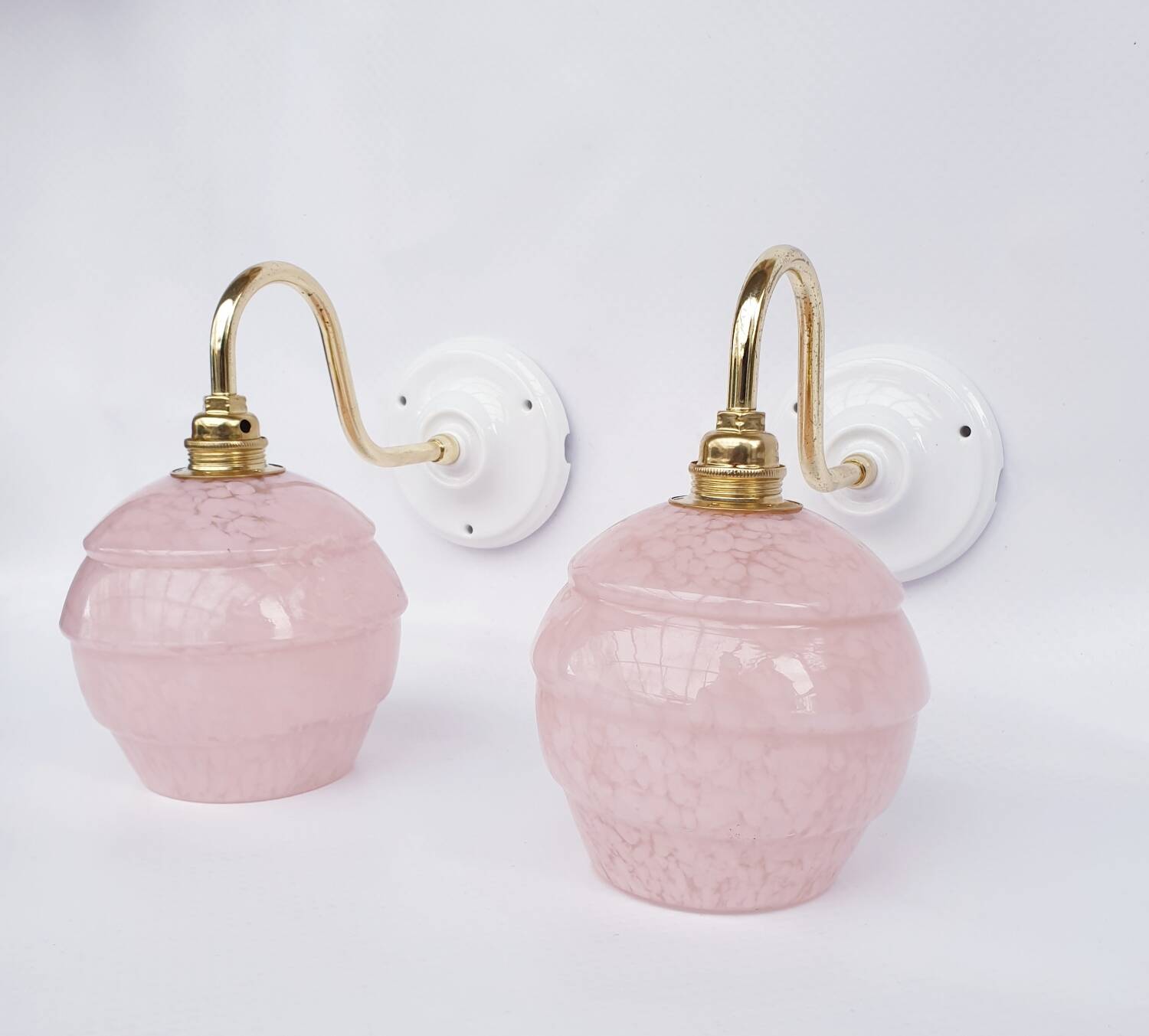 pair of vintage speckled pink and brass wall lights