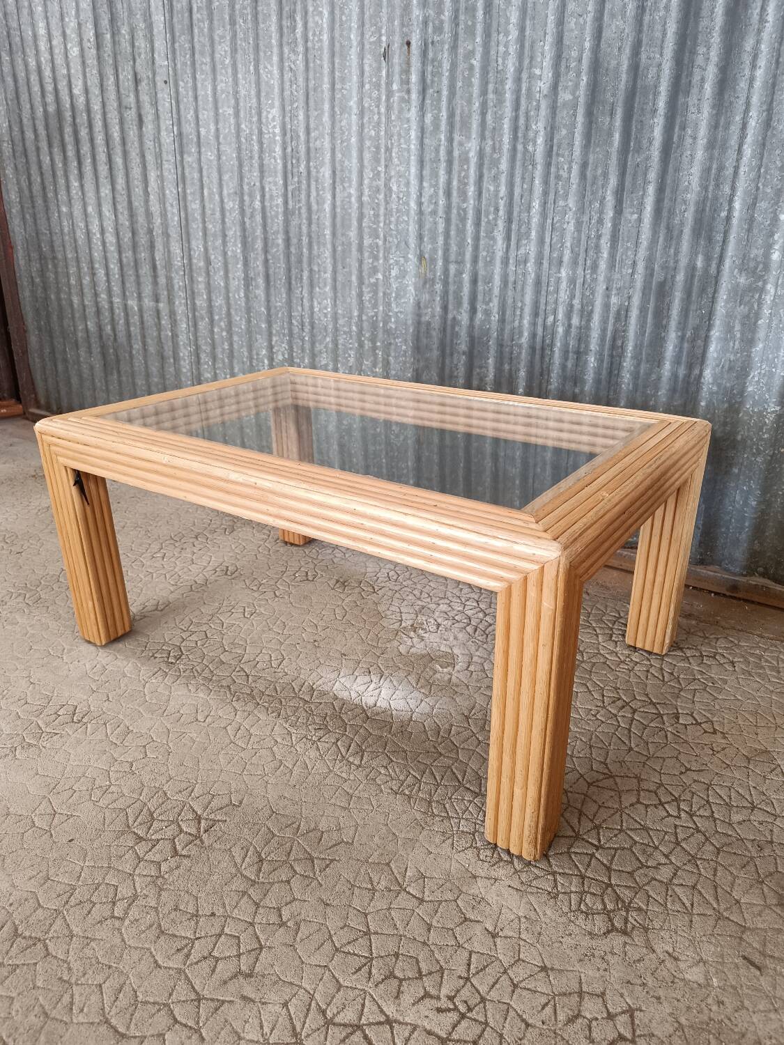 Glass coffee table in rattan/bamboo