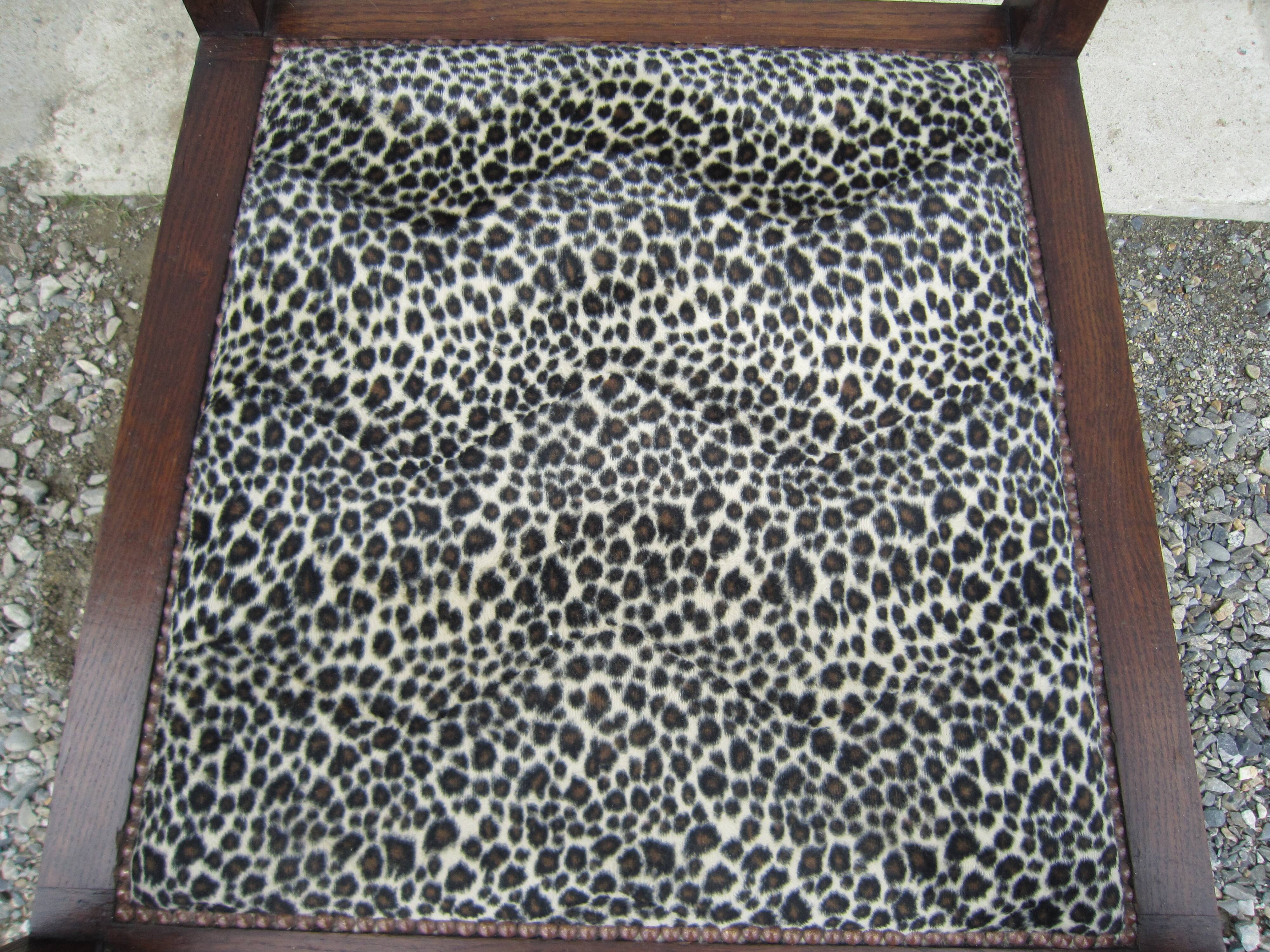Old leopard fabrics armchair
