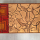 Table basse 60s haut émaillé Couleur rouge et or, base en métal et en laiton.