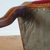 Red voltaire armchair