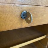 1950s oak office storage cabinet with curtains.