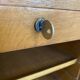 1950s oak office storage cabinet with curtains.