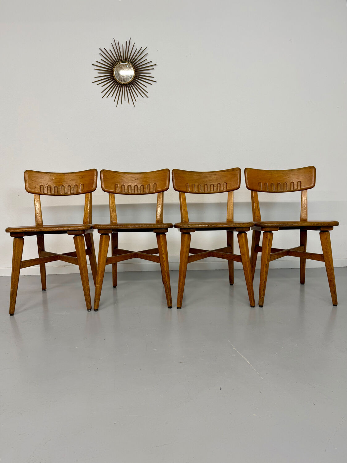Set of 4 vintage solid oak chairs, 1960s design with sculpted backrest.