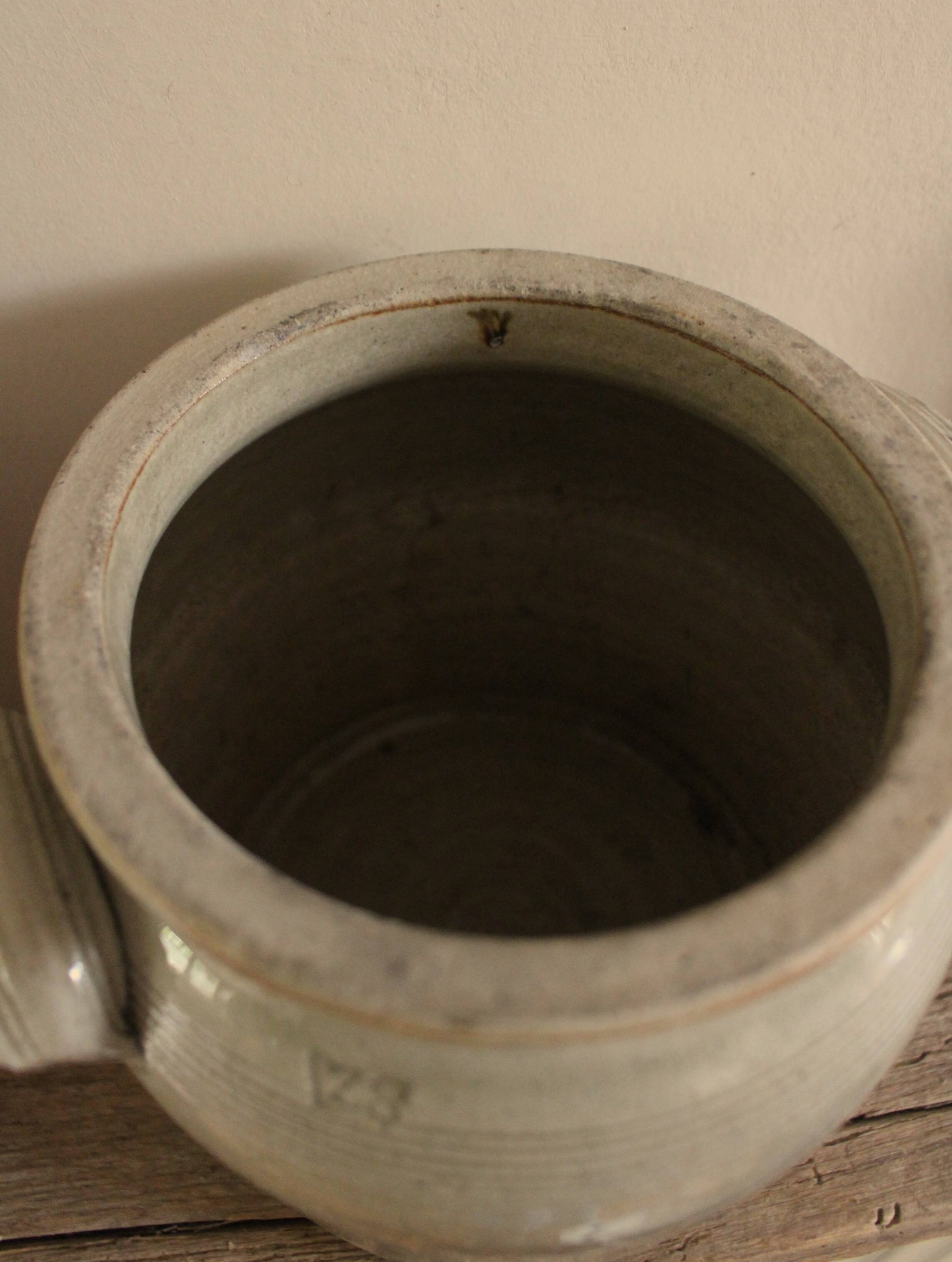 Glazed stoneware pot with two handles