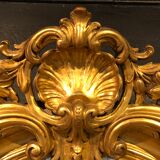 Golden oval mirror