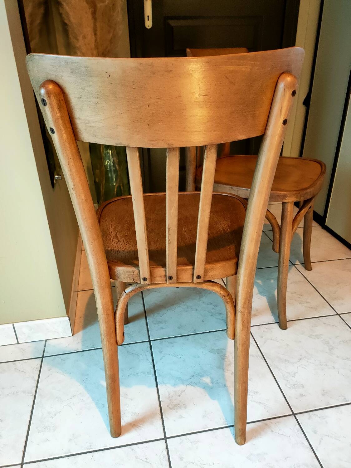 Pair of curved wooden bistro chairs