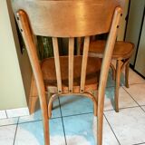 Pair of curved wooden bistro chairs