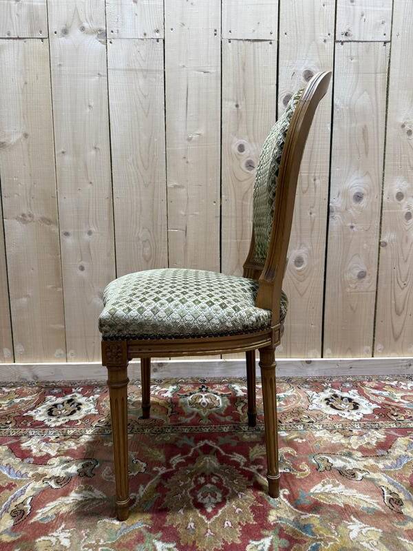 Suite de 4 chaises style Louis XVI "Fer à cheval"