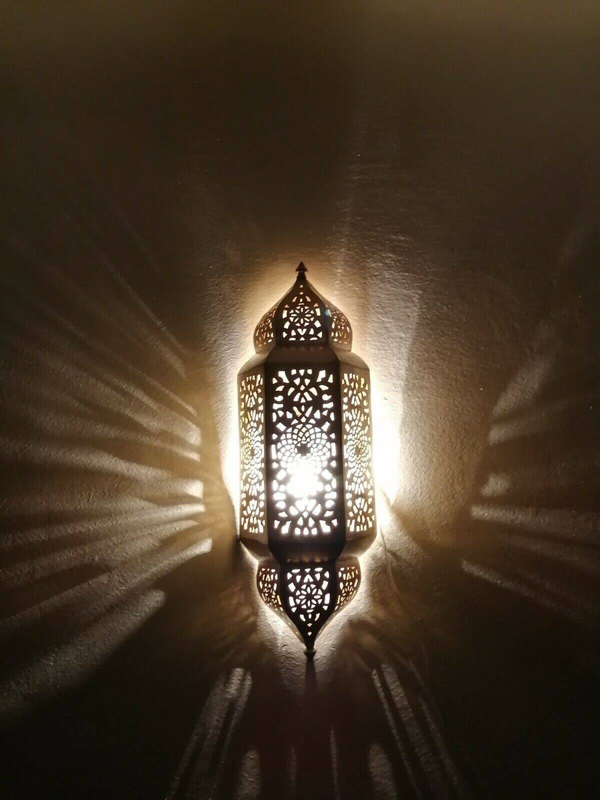 Moroccan brass wall lamp with an antique look