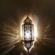 Moroccan brass wall lamp with an antique look