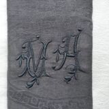 Old embroidered table napkin MA dark grey