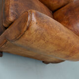 French moustache back cognac-colored leather club chair, 1940s