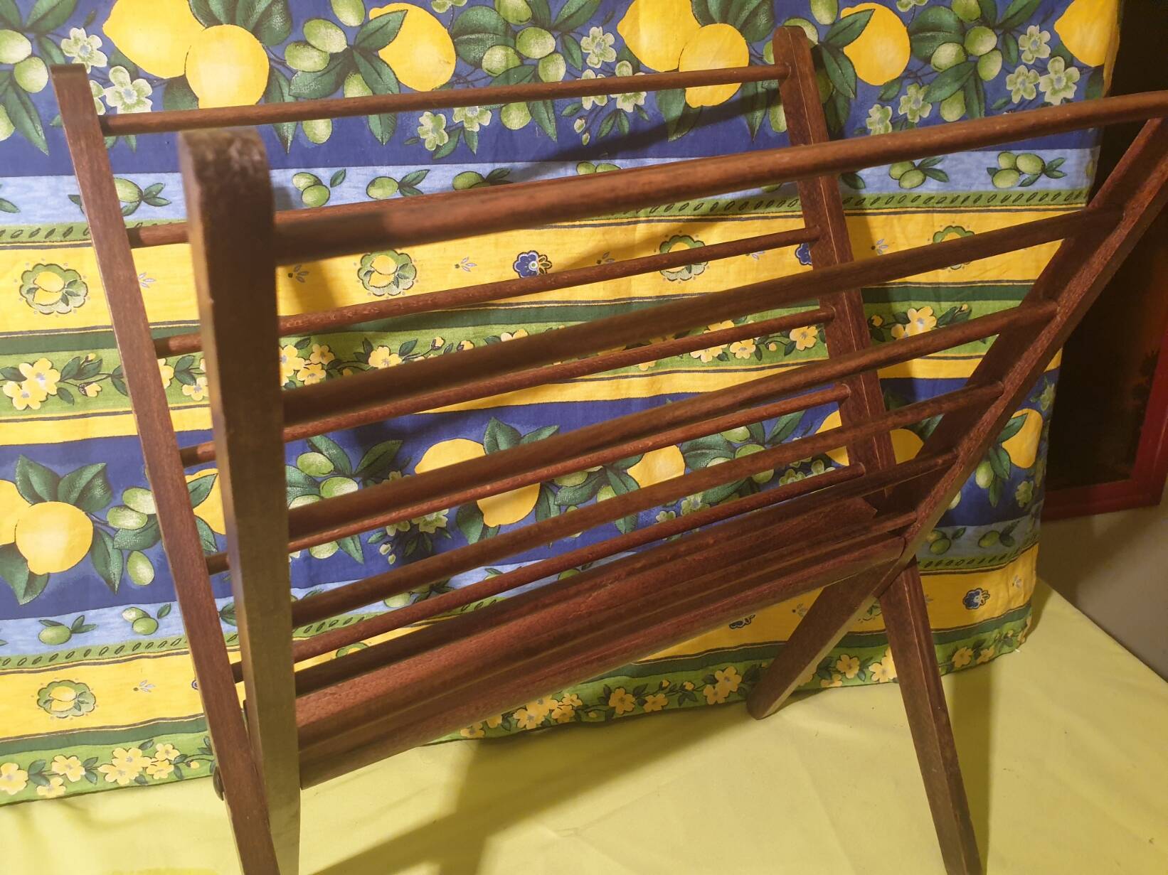 Scandinavian wooden folding magazine rack