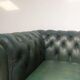Vintage English green leather chesterfield sofa