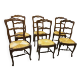 Regence chairs in straw-covered oak