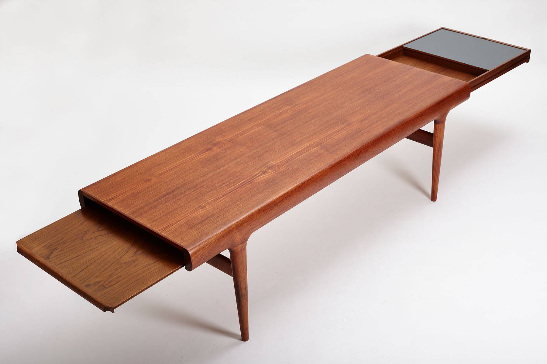Extendable coffee table designed by Johannes Andersen for Uldum Møbelfabrik, Denmark, 1960s.