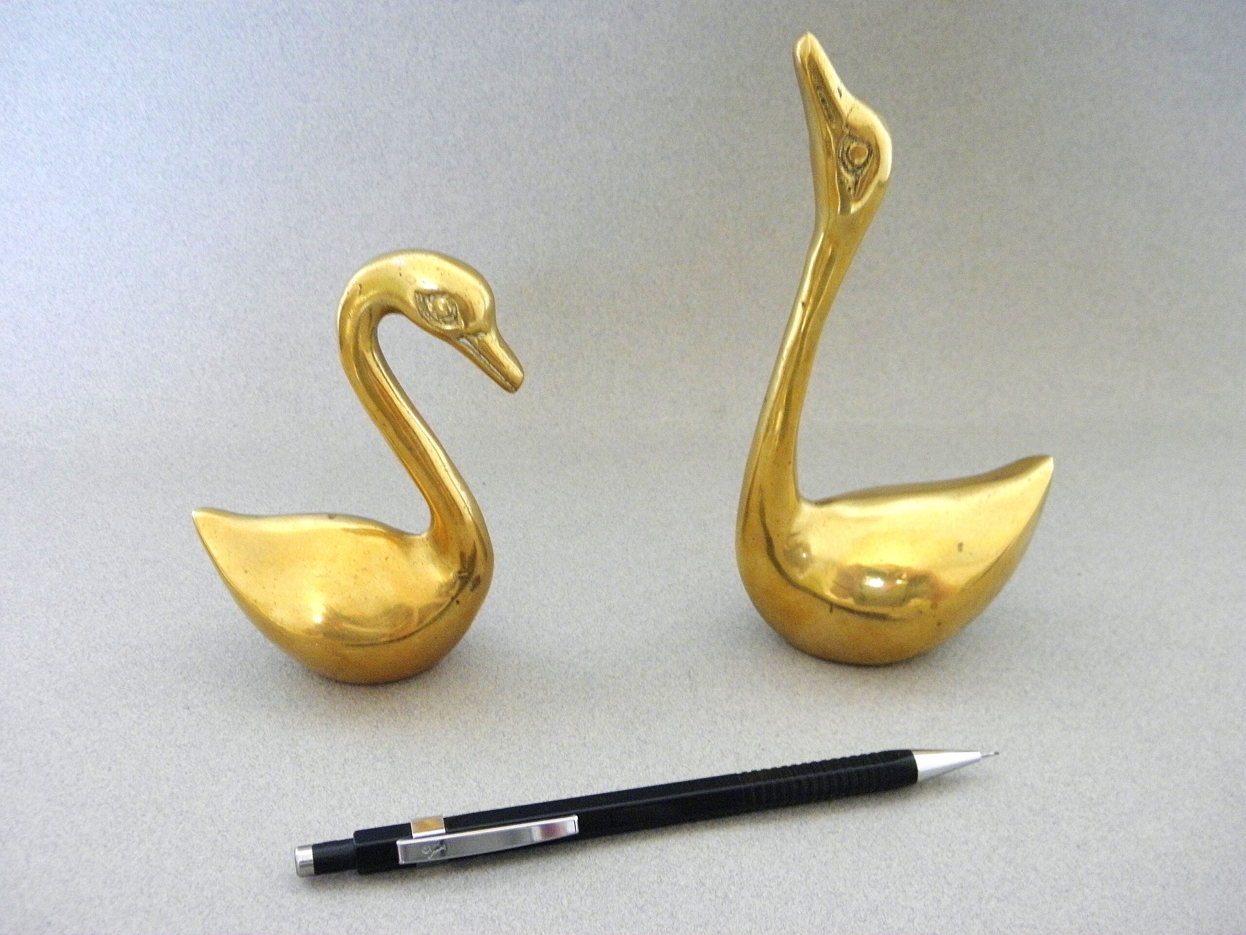 Pair of swans brass