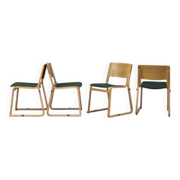 A set of four chairs in light oak (Theo chairs by Chorus)