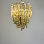 Venetian chandelier in colourless and gold Murano glass, Venini Triedi model, circa 1960.