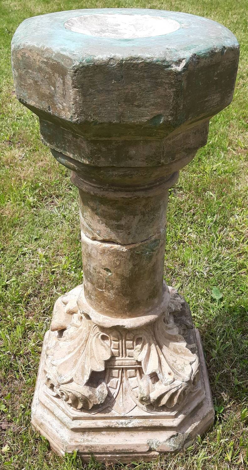 Holy water font on stone column (17th century)