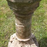 Holy water font on stone column (17th century)
