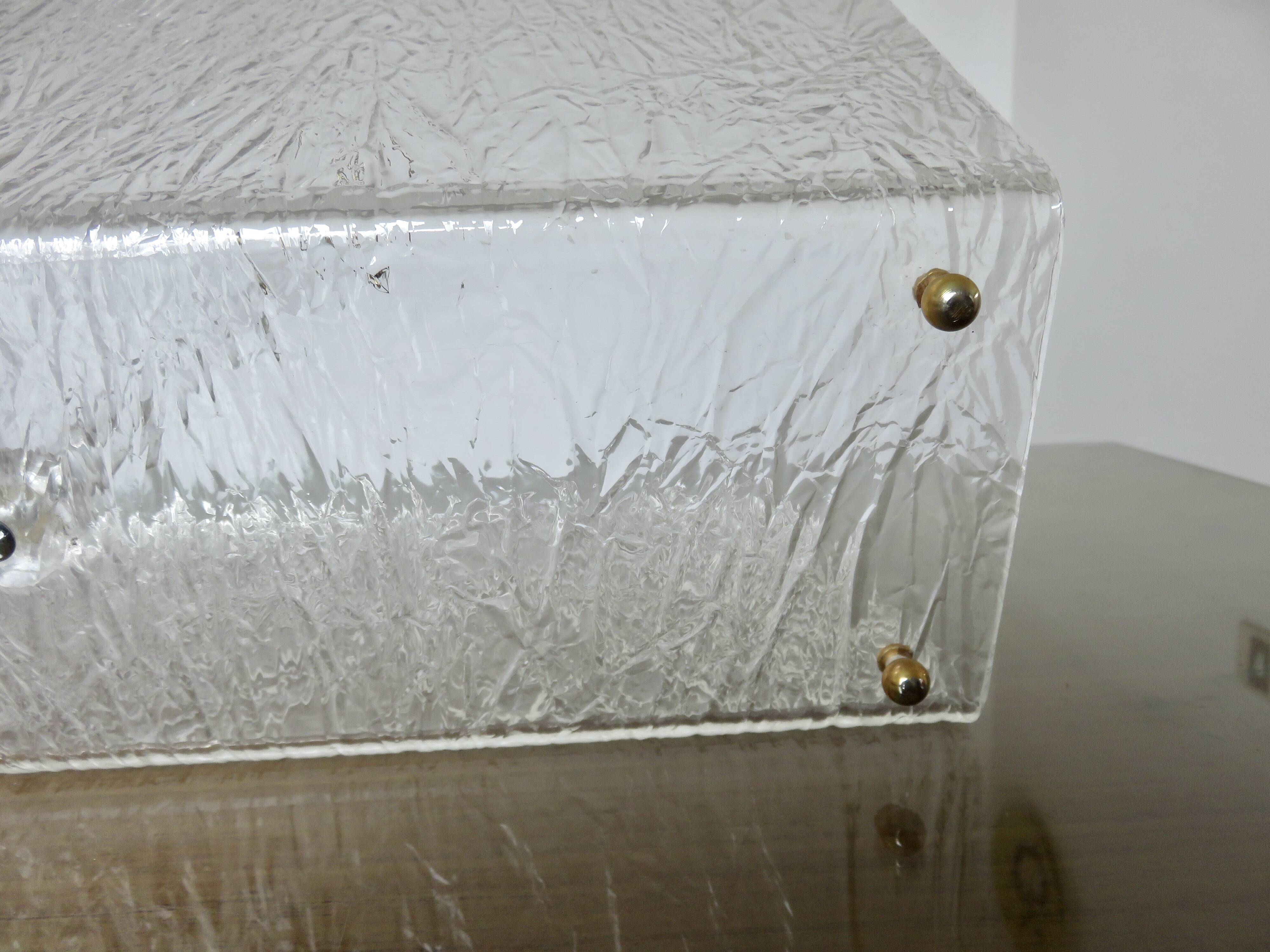 "Roche Bobois" magazine rack in lucite, plexiglass, altuglas and brass, 1970