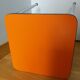 Chrome metal and orange formica stool