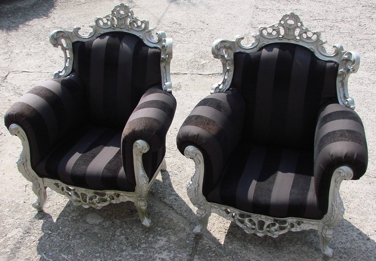 A pair of vintage armchairs, 1980s, lacquered wood and fabric