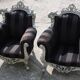 A pair of vintage armchairs, 1980s, lacquered wood and fabric