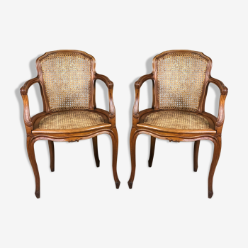 Louis XV style armchairs (the pair) in molded and canned walnut