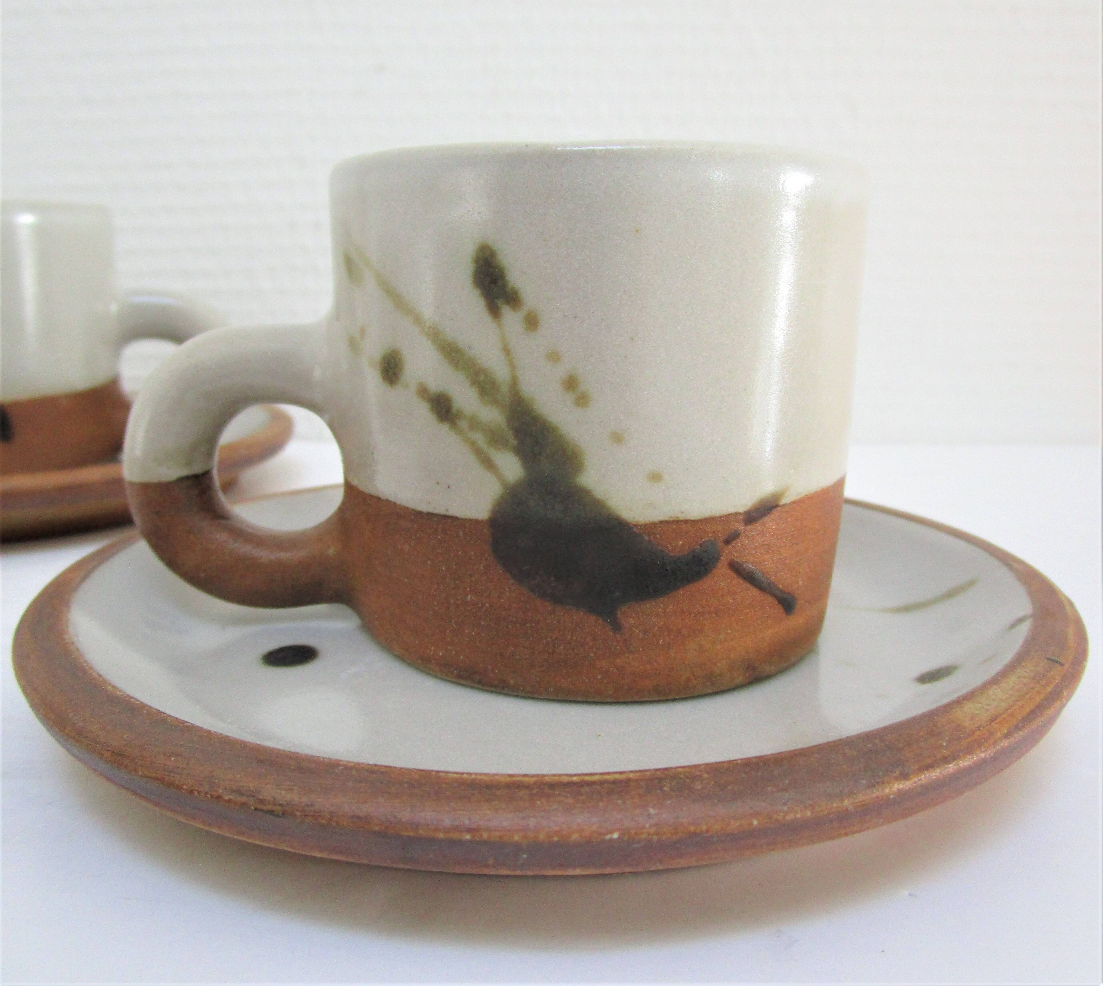 Four pottery cups and saucers from La Colombe Vallauris